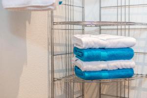 a metal towel rack with towels in a bathroom at Jeglehof in Salem +80 photos