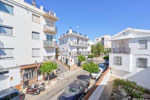 an overhead view of a city street with buildings at Apartmento Los Alamos in Nerja