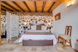 a bedroom with a bed in a room at Estudio Pu in La Vegueta