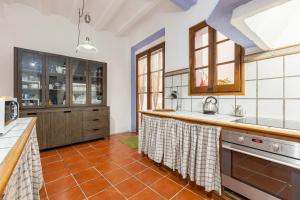 a kitchen with a sink and a counter at Maresme Natura in Sant Iscle de Vallalta