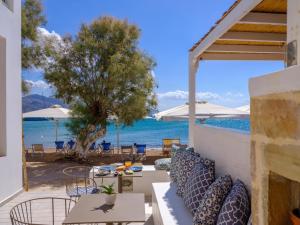 a patio with a view of the ocean at Echinousa Kimolos katoikia no6 in Kimolos
