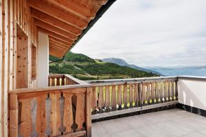 a balcony with a view of the mountains at Almhaus Morgenrast in Sarntal
