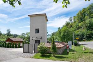 a small building with the number four on it at Gutenburgturm 18qm auf 3 Etagen in Waldshut-Tiengen