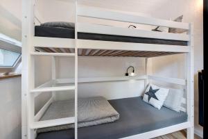 a bunk bed room with two bunk beds at Gutenburgturm 18qm auf 3 Etagen in Waldshut-Tiengen