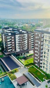 an overhead view of a city with tall buildings at Ilo2stayAirbnb 1BR 334 in Molo