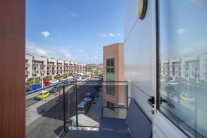 a balcony with a view of a city street at Vv Brisamar in Telde