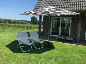 Zahrada ubytování Huisje Wevers