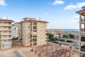 an apartment building with a view of a city at Viñamar 7 in La Mata