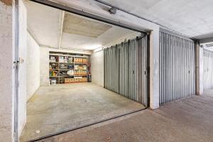 an empty room with a sliding door in a building at U Canetta 2 in Pietra Ligure