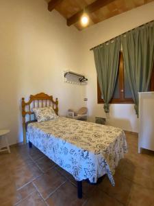 a bedroom with a bed in a room at The Paradise in Esporles