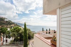 a view of the ocean from a house at Ca La Nyca in Tossa de Mar