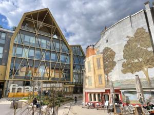 a building with a mural on the side of it at Hyper centre, rue piétonne, calme in Dijon