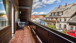 a balcony with a view of a city at Ferienhaus Unmüßig in Hinterzarten