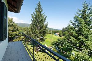 a balcony of a house with a view of trees at Ai campi in Stella