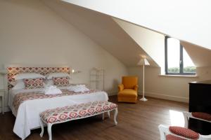Кровать или кровати в номере Hotel Casa Palmela - Small Luxury Hotels of The World, Hotel & Villas