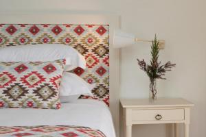 Кровать или кровати в номере Hotel Casa Palmela - Small Luxury Hotels of The World, Hotel & Villas