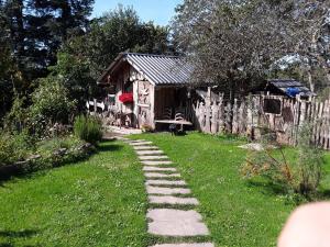 a stone path in front of a house at Ferienwohnung Eifelzauber in Greimerath
