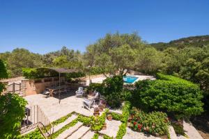 an aerial view of a patio with a pool and trees at Son Reus in Felanitx