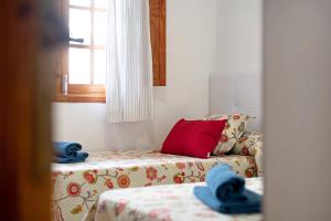 a living room with a couch and a window at Casa Carmen in Puerto del Carmen