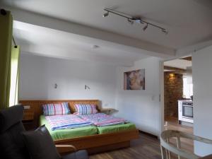a bedroom with a bed in a room at Ferienhof Bieke in Finnentrop +90 photos