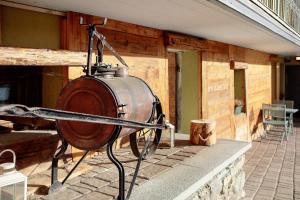 a fire hydrant on the side of a house at La Maison de Karen The Deer House in Gignod