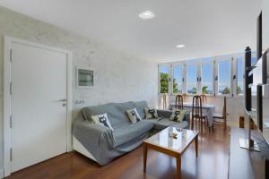 a living room with a couch and a table at Casa Santana in Vecindario