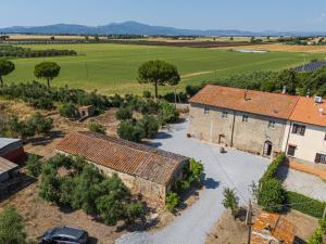 an aerial view of a farm with a building at Il Podere Del Ponti - Paduletto in Casa Paduletto