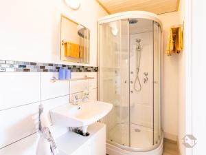 a bathroom with a shower and a sink at Haus Umbeer in Schömberg +71 photos