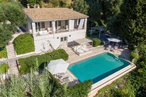 an aerial view of a house with a swimming pool at Villa Armonia in Pyrgi