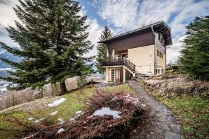 a house on the side of a hill at Chalet Franclair in Samoëns