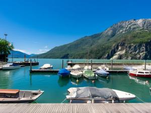 a bunch of boats are docked in a harbor at Casa Nadia in Verceia