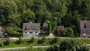 an aerial view of a house in a village at Ferienoase Weitblick in Rinteln