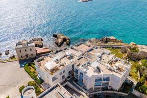 an aerial view of a building next to the ocean at Olimpia's home in Otranto in Otranto