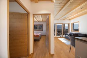 a living room with a couch and a table at Ferienwohnung 1 Weger in Andrian