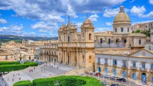 an image of a building in a city at La Casetta del Cuore in Noto