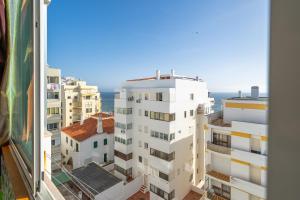 a view from the window of a building at Apartamento Belmar in Armação de Pêra