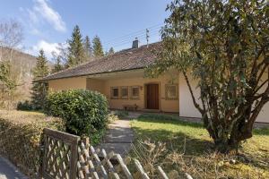 a house with a fence in front of it at Donau-One in Beuron