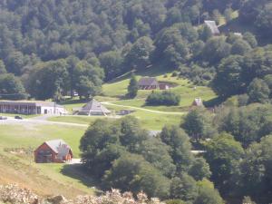 an aerial view of a farm with houses and trees at Charmant appartement à Ainhoa in Ainhoa +20 photos