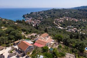 an aerial view of a town and the ocean at Victoria's House in Gaios