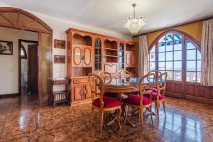a dining room with a table and chairs at Tresa in Lloret de Mar