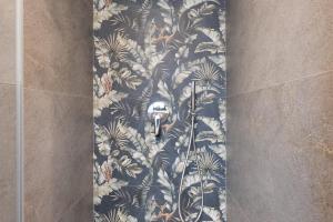 a skateboard on a wall in a bathroom at Luxury Ossana in Fucine +63 photos