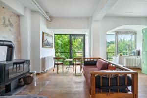 a living room with a couch and a fireplace at Fewo Boho in der Altstadt in Pirna