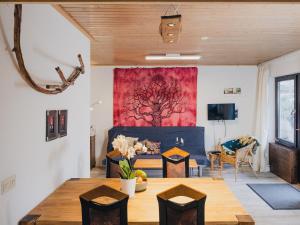 a living room with a table and a couch at Haus Umbeer in Schömberg