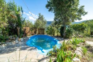 a swimming pool in the middle of a yard at Casa Mariti in Mont-ral