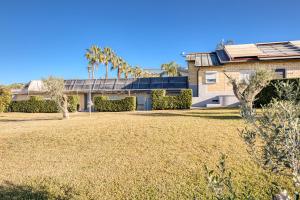 a house with a yard in front of it at Residence Margherita in Ugento