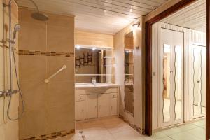 a bathroom with a shower and a sink at Le Repaire in Cassis +12 photos