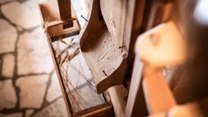 a close up of a wooden door on a wall at Burgfrieder Mühle in Rasun di Sopra