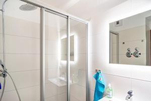 a bathroom with a shower and a sink at Räuberhöhle in Goslar +25 photos