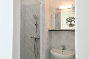 a bathroom with a shower and a sink at Chambres d'hôtes - Chez Antho in Betton-Bettonet +54 photos