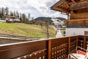 a balcony with a view of a mountain at Chalet Sonneck - Seefeld in Seefeld in Tirol